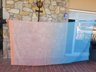 Cortina degradado naranja y turquesa