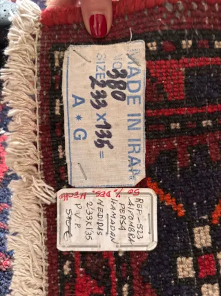 Alfombra persa de lana roja y azul