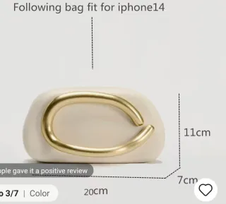 Bolso de mano dorado con caja