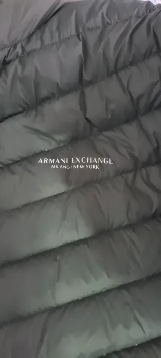 Chaqueta verde acolchada con cremallera