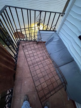 Hamaca de hierro forjado con colchoneta