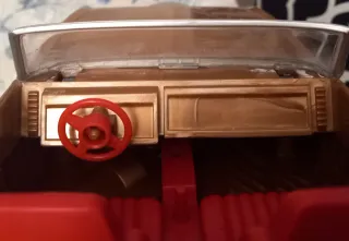 El Último Gran Héroe. Coche y figuras