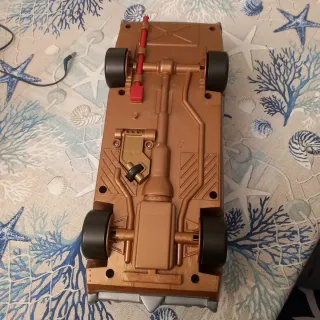 El Último Gran Héroe. Coche y figuras