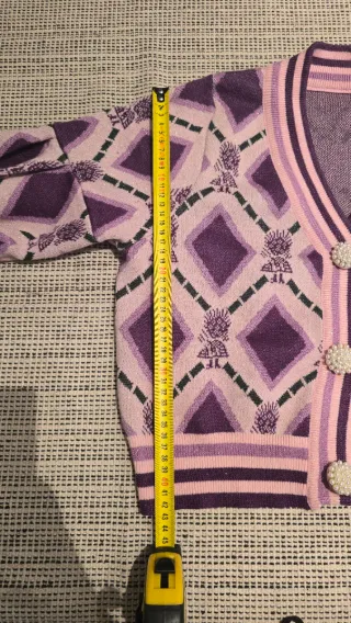 Rebeca joya rosa y morada