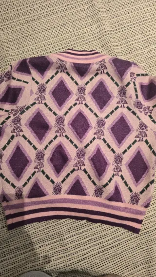 Rebeca joya rosa y morada