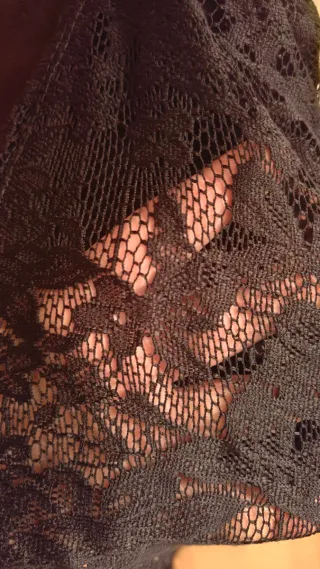 Chaqueta de encaje negro con flecos