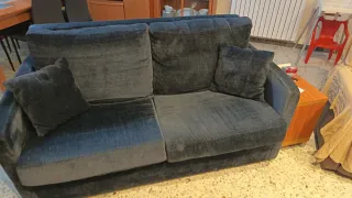 Sofá cama tela.Siempre con funda.La cama no husada