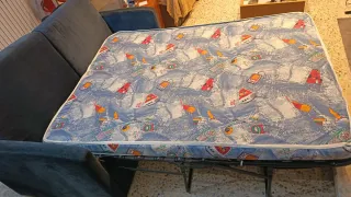 Sofá cama tela.Siempre con funda.La cama no husada