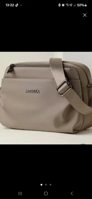 Bandolera impermeable beige nueva