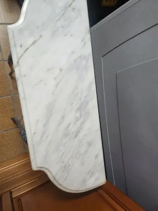 Entradita de forja con mármol