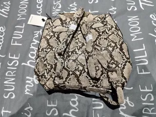 Mochila estampado serpiente