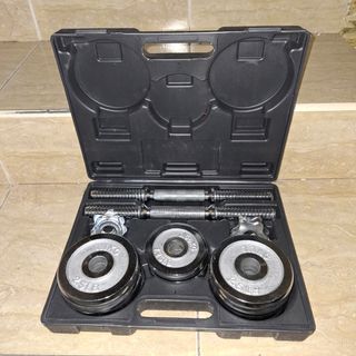 Manubri con dischi e valigetta