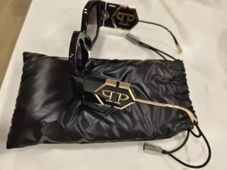 Gafas de sol Philipp Plein negras y doradas