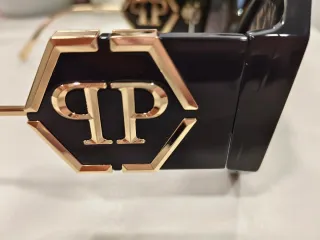 Gafas de sol Philipp Plein negras y doradas