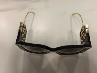 Gafas de sol Philipp Plein negras y doradas