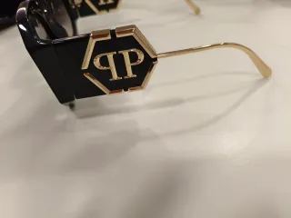 Gafas de sol Philipp Plein negras y doradas