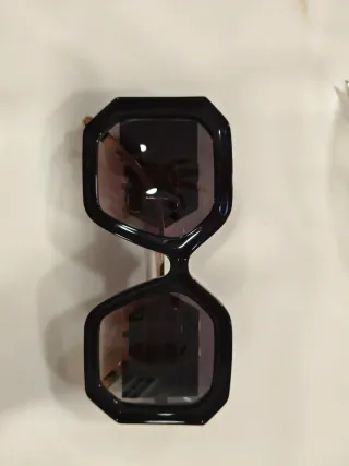 Gafas de sol Philipp Plein negras y doradas