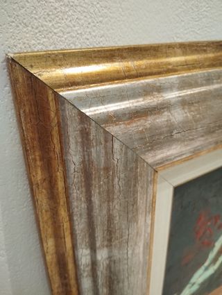 Pintura al óleo con marco.