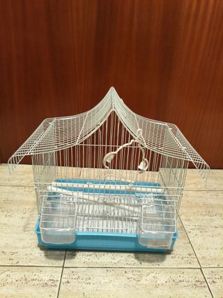 Jaula para pájaros con columpio