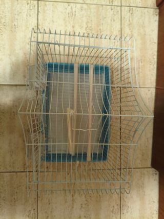 Jaula para pájaros con columpio