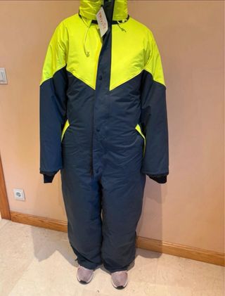 Mono de esquí amarillo y azul negro