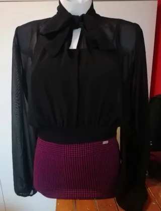 Maglia nera e fucsia velata