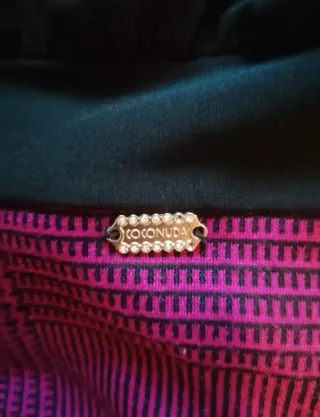 Maglia nera e fucsia velata