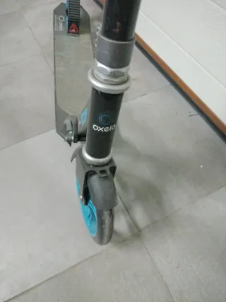 Patinete infantil azul y negro