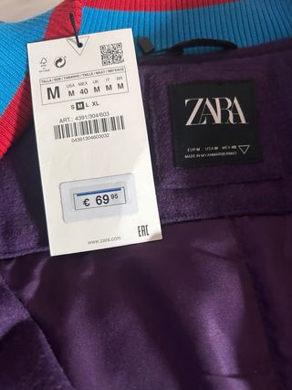 Cazadora bómber con parches Zara