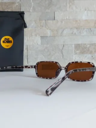 Occhiali da sole fantasia leopardata grigia