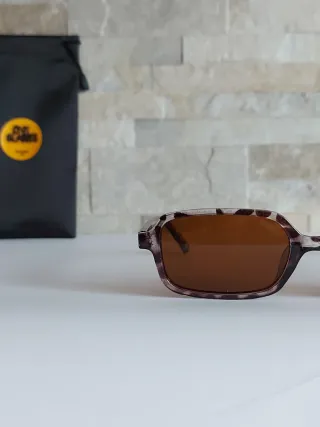 Occhiali da sole fantasia leopardata grigia