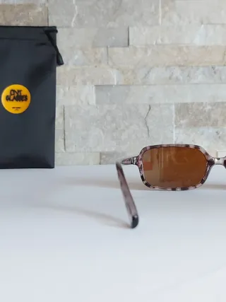 Occhiali da sole fantasia leopardata grigia