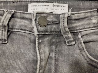 Conjunto vaquero y jersey gris.t.xs