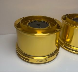 Bobinas de pesca Rely doradas