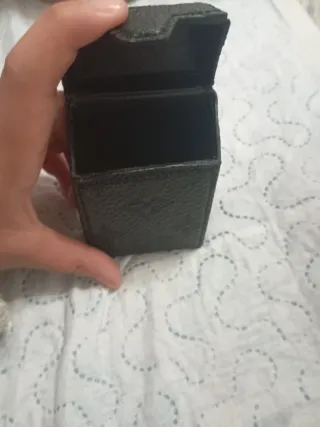 Cartera negra poco vieja pero bonita