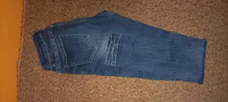 Pantalón vaquero mujer con rotos y lentejuelas