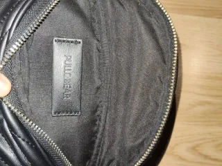 Riñonera acolchada negra