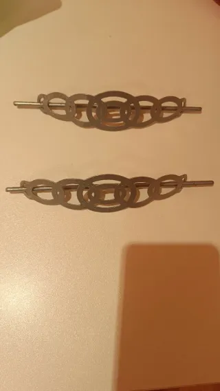 Sujetadores de cortina de metal