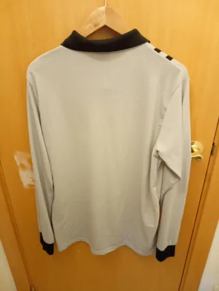 Polo manga larga transpirable