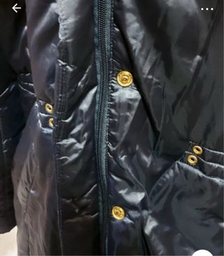 Abrigo plumifero azul con efecto brillo