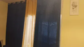 Sofá modular azul y dorado