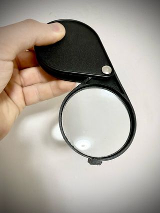 Lupa de bolsillo plegable negra