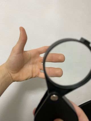 Lupa de bolsillo plegable negra