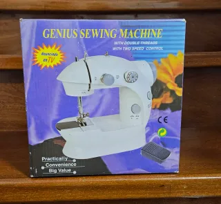 Máquina de coser eléctrica compacta