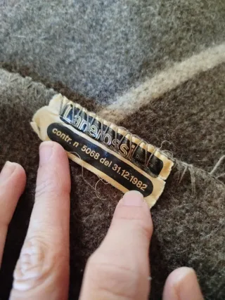 Coperta lana grigia a righe