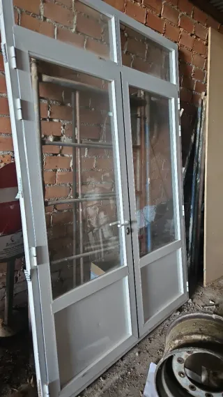 Puerta aluminio doble cristal