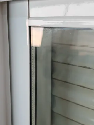 Ventana corredera con persiana