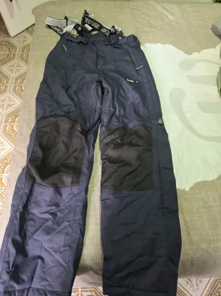 Pantalones de nieve azules con tirantes