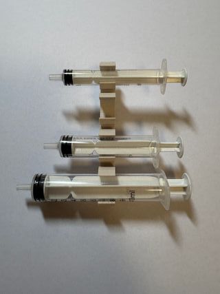 Soporte para jeringas