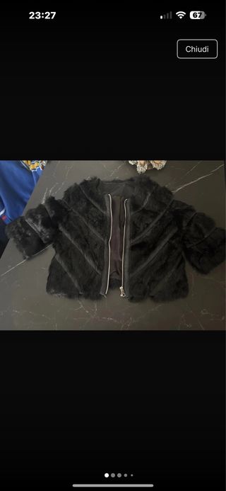 Giacca in pelliccia e pelle nera